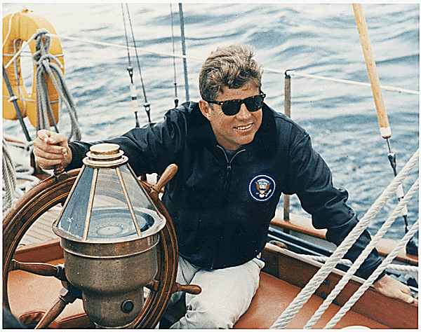 President Kennedy at the wheel of the US Coast Guard Yacht "Manitou,. Boothbay Harbor, August 12, 1962