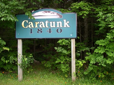 sign: Catatunk 1840, with image of Pleasant Pond
