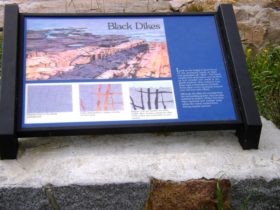 sign: "Black Dikes" at Schoodic Point (2004)
