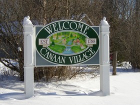 Sign: Welcome to Canaan Village (2005)