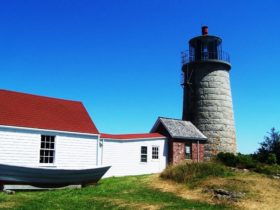 Monhegan Museum with dory on exhibit and attached Monhegan Light (2007)