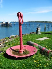 Large muchroom anchor on land in Rockland Harbor