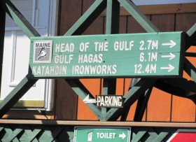 sign: "Head of the Gulf 2.7 M =>, Gulf Hagas 6.1 M =>, Katahdin Iron Works 12.4 M =>"