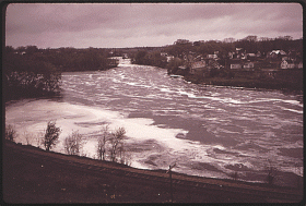 Foam, a Sign of Pollution, Floats on the St. Croix River at Calais (1973)