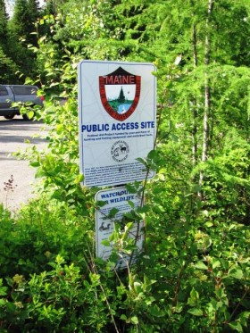 Sign: "Public Access Site" near the River