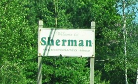 Sign: "Welcome to Sherman" (2012)