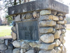 Stone Pillar with Plaque: "Good Will, 1889"