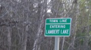 sign: Town Line, Entering Lambert Lake (2013)