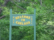 sign: "Welcome to Garland" (2014)