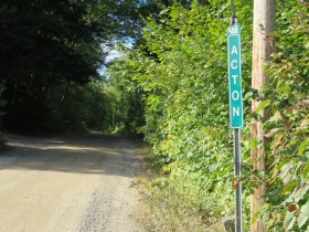 Sign: "Town Line Acton" (2014)