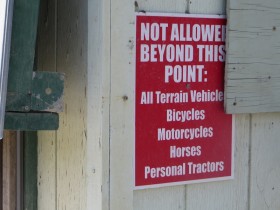 Notice at North Maine Woods Checkpoint on American Realty Road (2015)