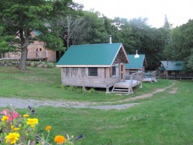 Restrooms/showers (left), Cabins and Bunkhouse (right)