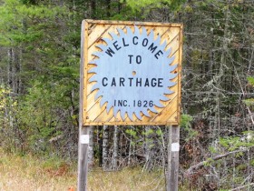 sign: "Welcome to Carthage, Inc. 1826" (2013)