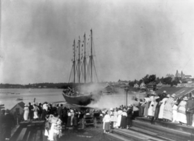 Launching of a ship, 4 mast schooner James E. Newson, Boothbay Harbor, Maine (c. 1920)