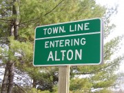 Sign: Town Line, Entering Alton