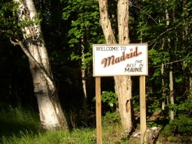 Sign: "Welcome to Madrid, the Best in Maine"
